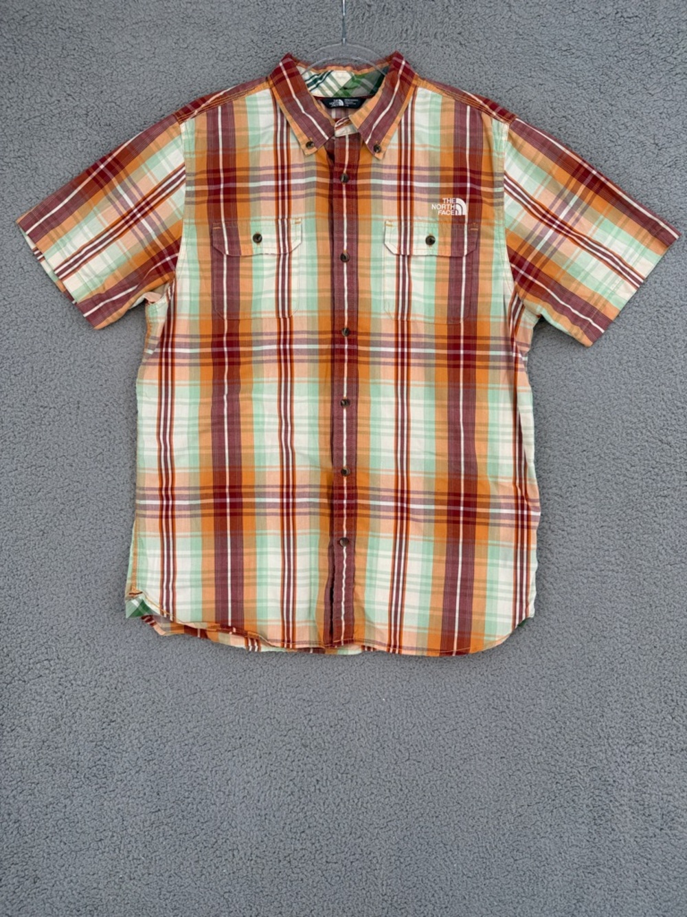 The North Face Men’s Large short sleeve button down shirt Orange Plaid outdoors